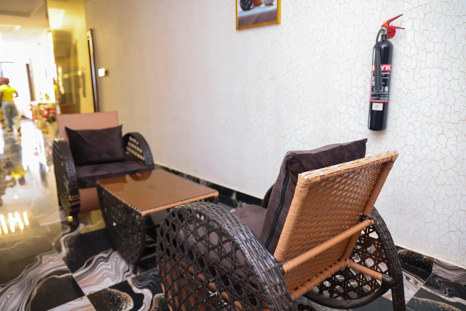 Rattan seating in a corridor lounge