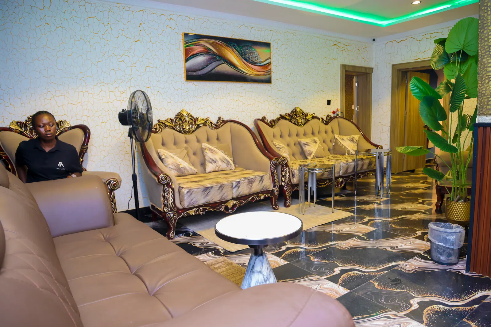 Gold sofas in the ground-floor waiting lounge