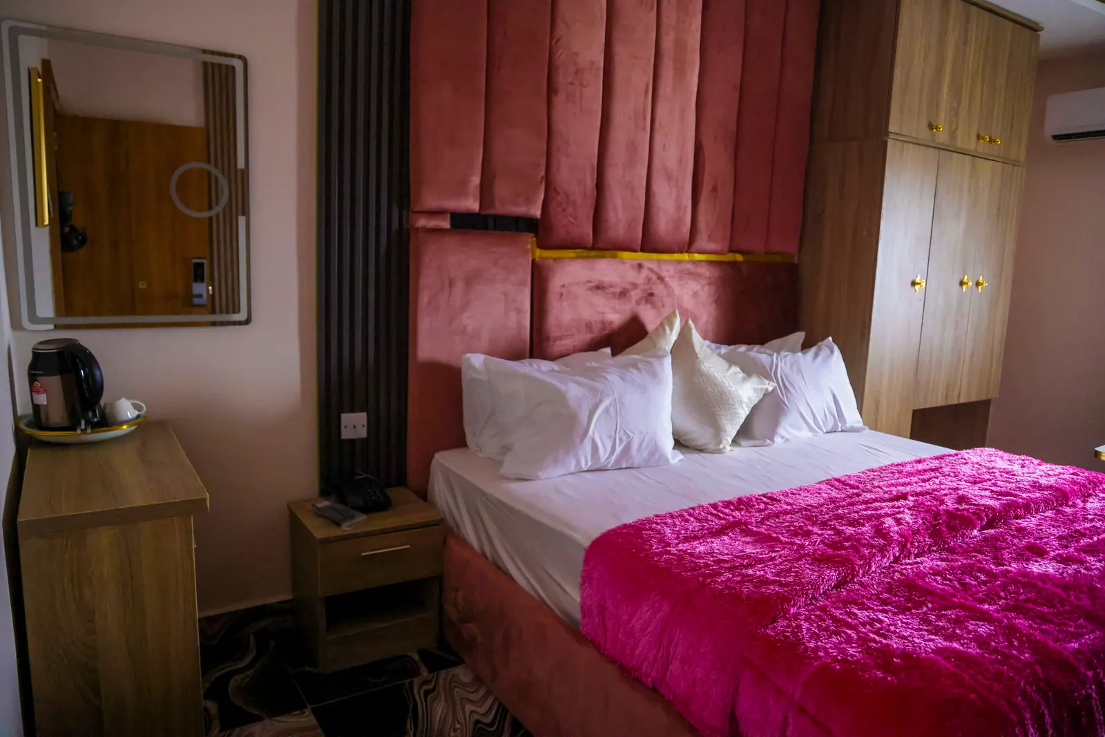 An Executive Suite, seen towards the wardrobe