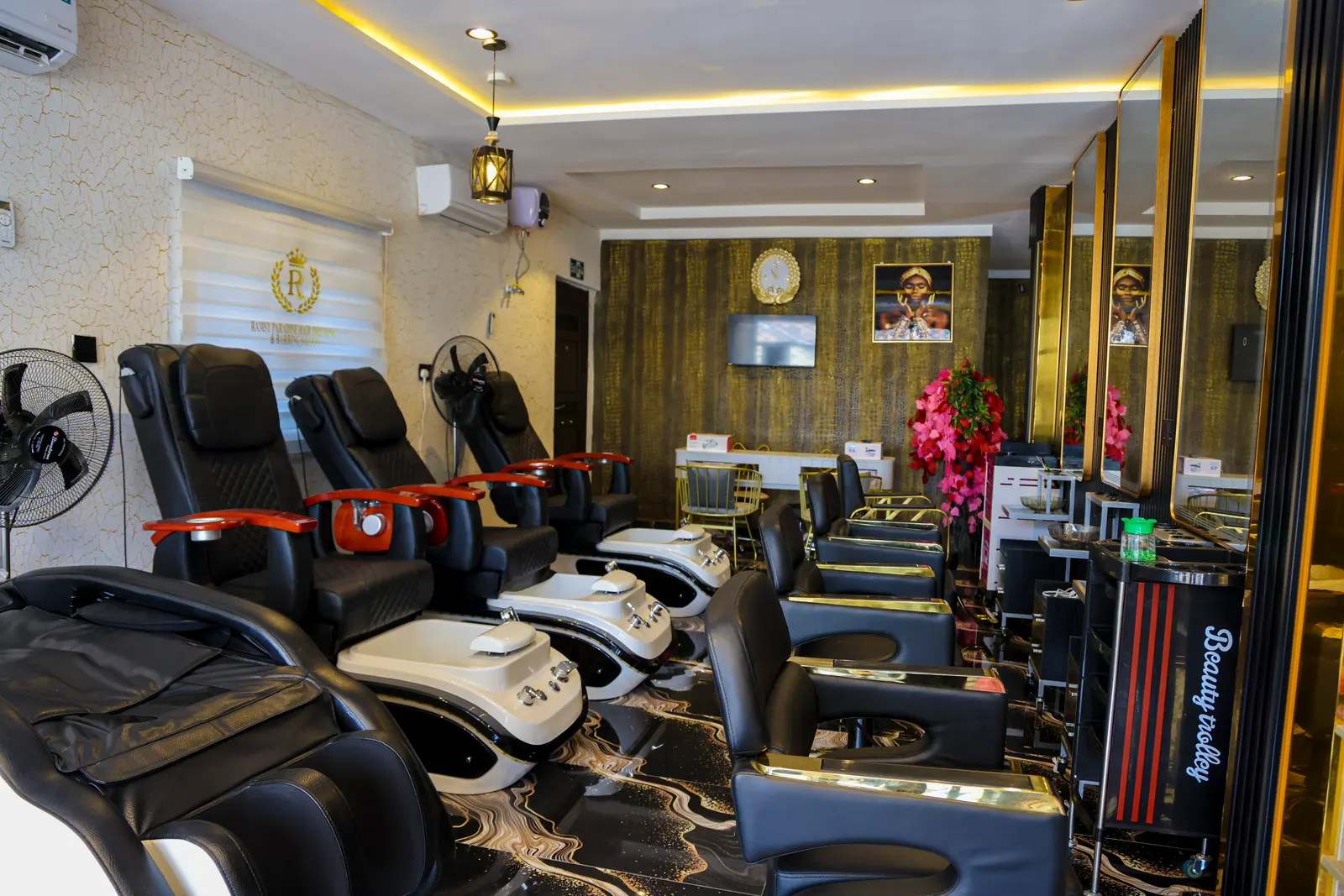 The hair and beauty salon, with styling and pedicure chairs